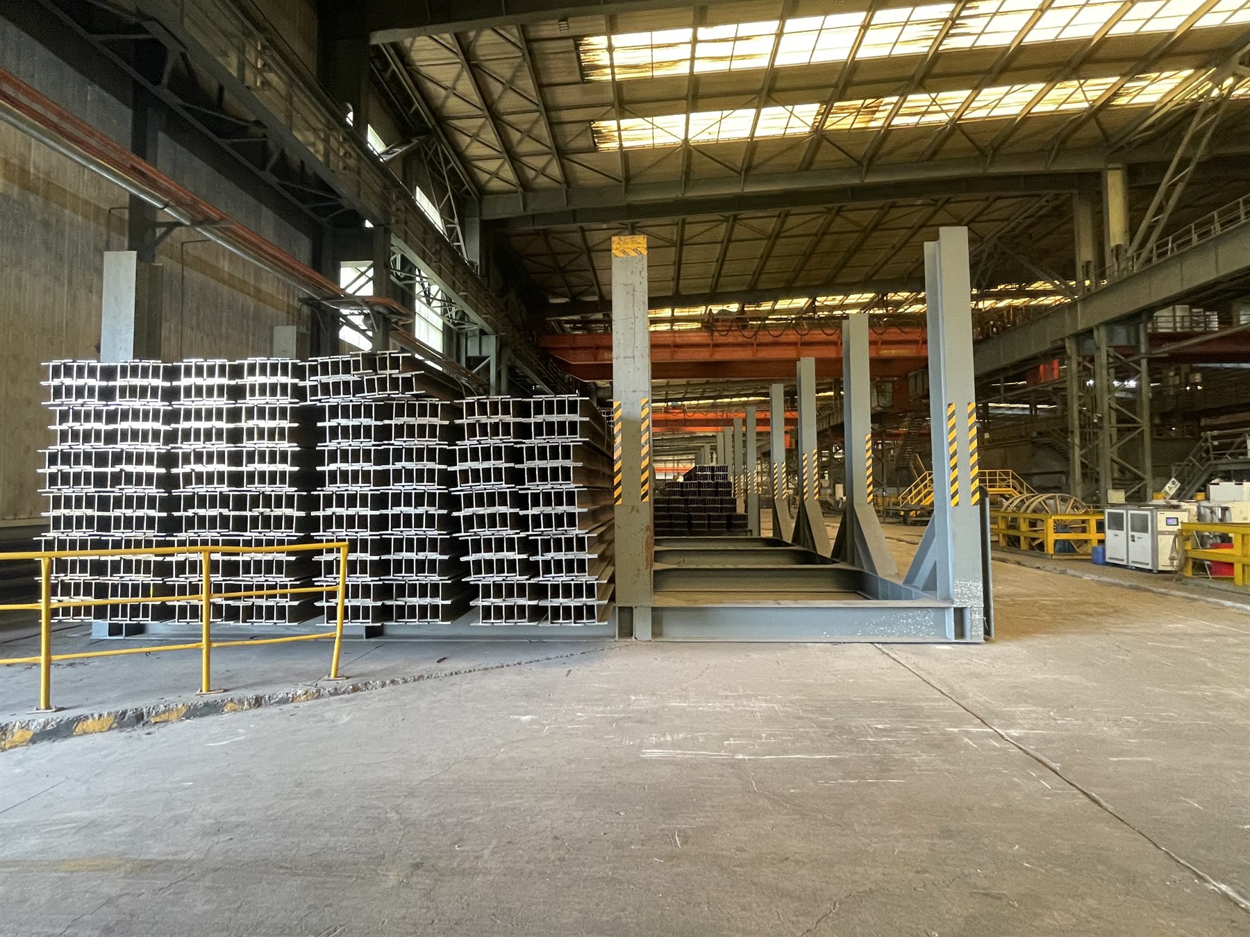 Profile steel stacked inside a warehouse